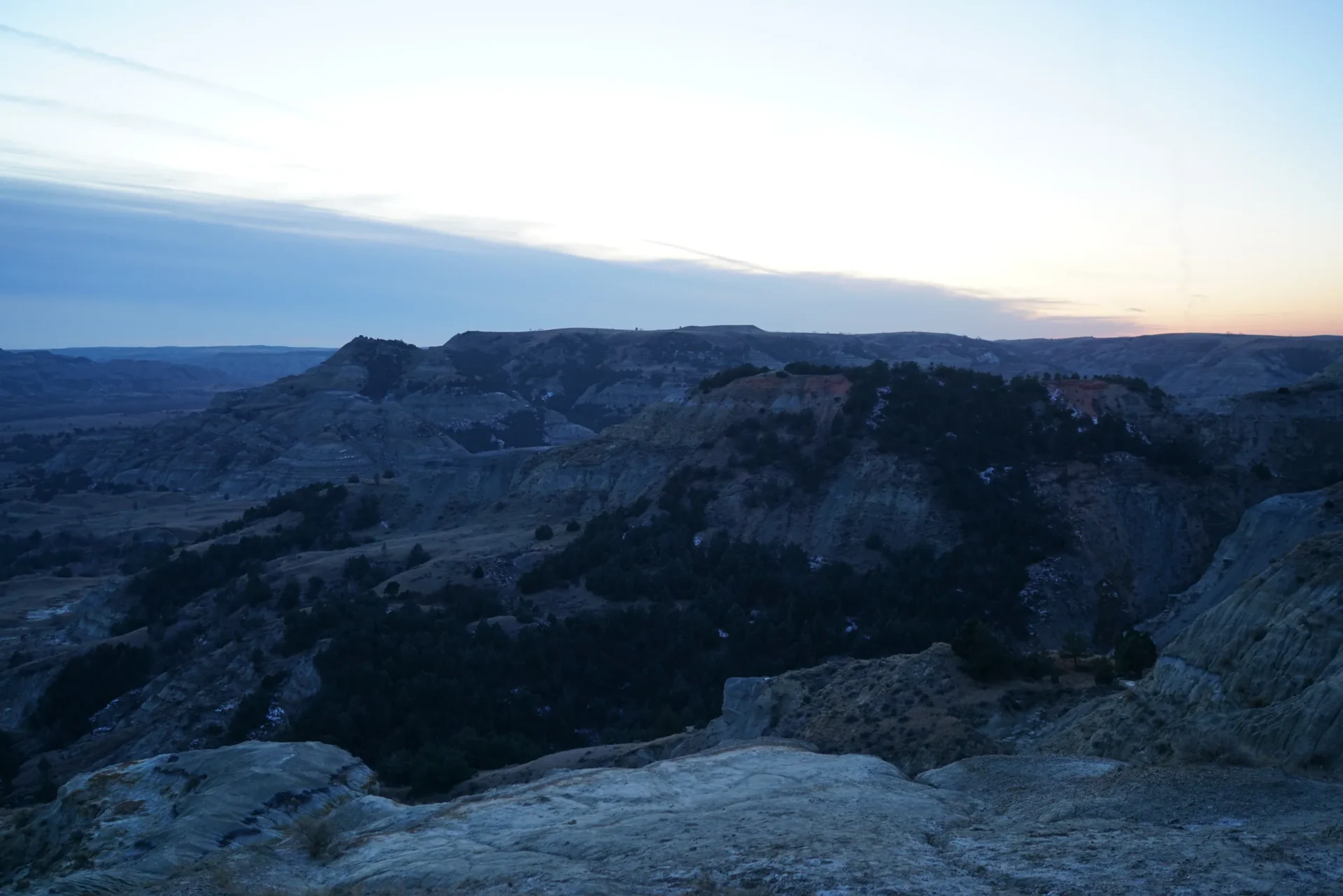 A view of the mountains from atop a mountain.