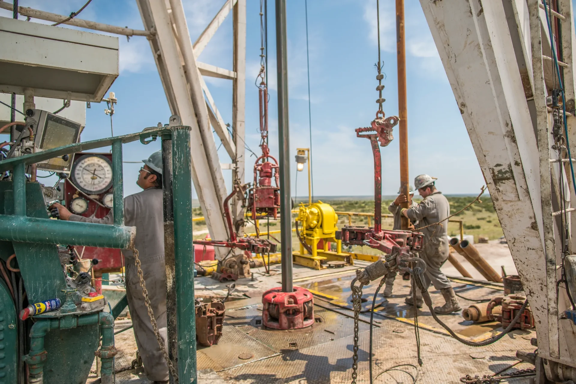 A group of men working on an oil rig.